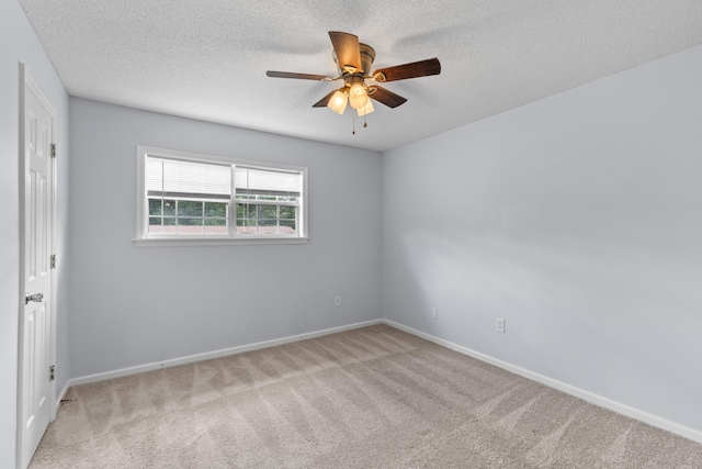 107 Hickory Ln Unit C, Ladson, SC 29456 - unfurnished bedroom with carpet flooring, a textured ceiling, and ceiling fan