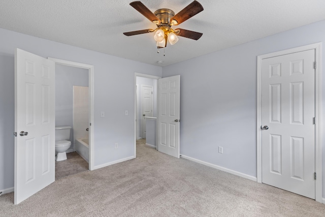 107 Hickory Ln Unit C, Ladson, SC 29456 - unfurnished bedroom featuring carpet floors, ensuite bath, and a ceiling fan