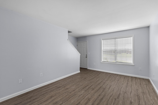107 Hickory Ln Unit C, Ladson, SC 29456 - unfurnished living room featuring dark wood finished floors and baseboards