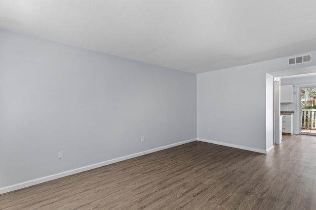 107 Hickory Ln Unit C, Ladson, SC 29456 - empty room featuring dark wood finished floors and baseboards