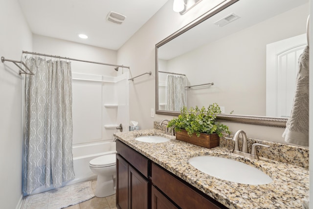 full bathroom featuring toilet, shower / bath combo, visible vents, and a sink