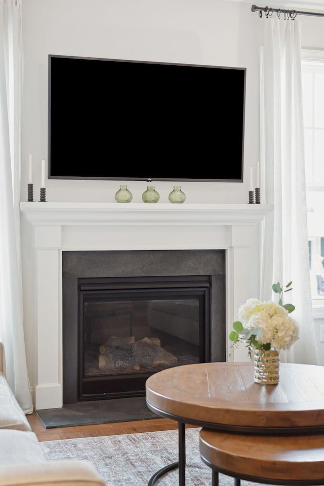 interior details featuring hardwood / wood-style flooring