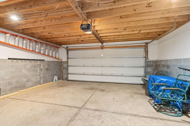 garage featuring a garage door opener