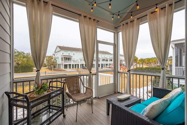 sunroom / solarium with a wealth of natural light