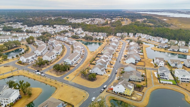 drone / aerial view with a water view