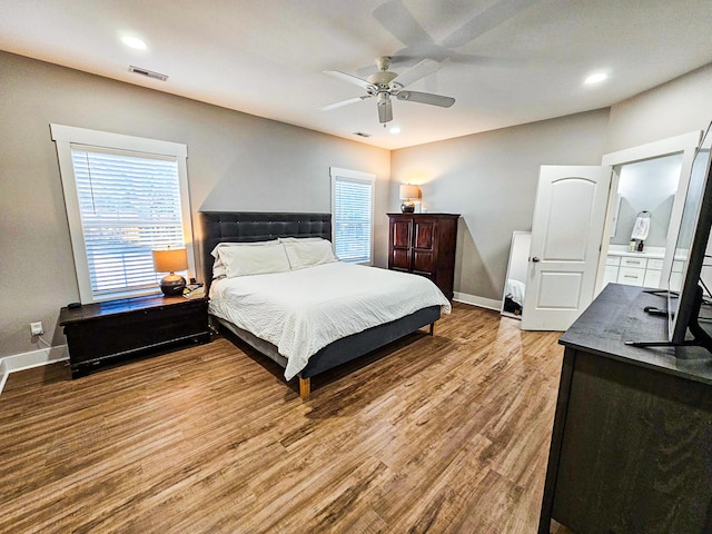 bedroom featuring ceiling fan and light wood-type flooring