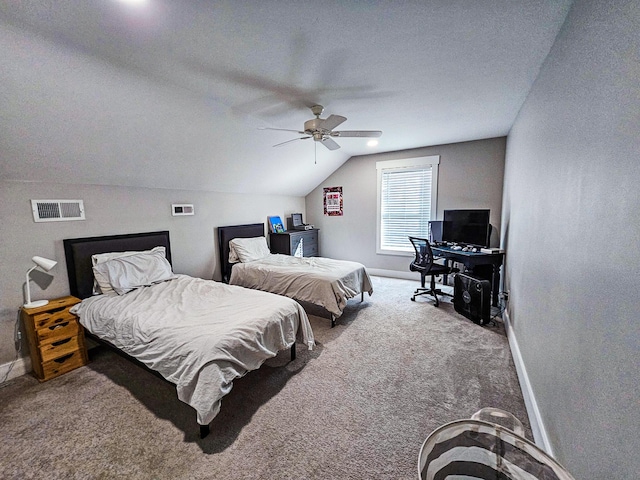 carpeted bedroom with vaulted ceiling, ceiling fan, and a textured ceiling