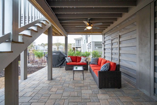 view of patio featuring ceiling fan, a grill, and an outdoor hangout area