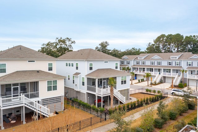 back of property featuring a sunroom