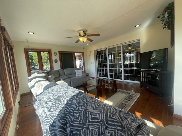 bedroom featuring recessed lighting, ceiling fan, baseboards, and wood finished floors