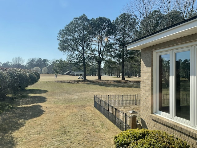 view of yard with fence