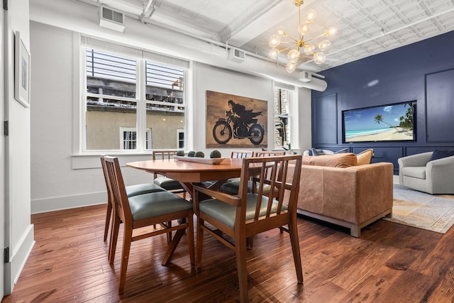 4 Beaufain St Unit 207, Charleston, SC 29401 - dining room featuring hardwood / wood-style flooring and a chandelier