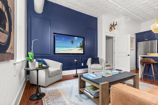 4 Beaufain St Unit 207, Charleston, SC 29401 - living room with an ornate ceiling and wood finished floors