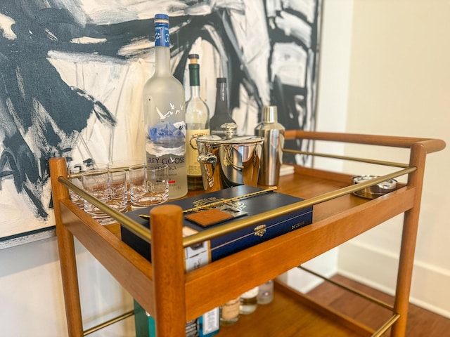 4 Beaufain St Unit 207, Charleston, SC 29401 - detailed view of wood finished floors and baseboards