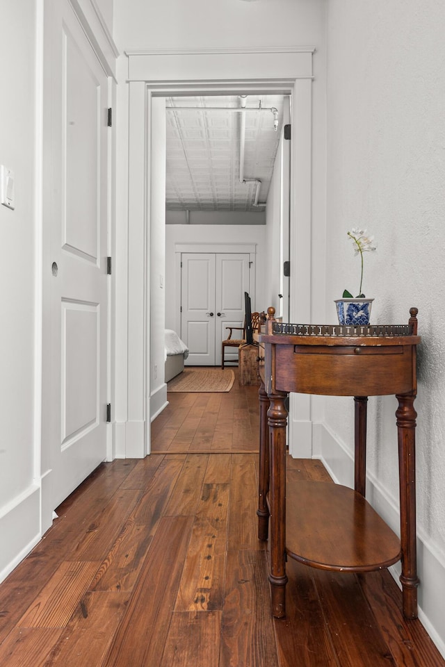 4 Beaufain St Unit 207, Charleston, SC 29401 - hallway with hardwood / wood-style floors and baseboards