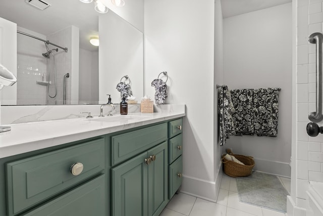 4 Beaufain St Unit 207, Charleston, SC 29401 - bathroom with vanity, tile patterned flooring, and tiled shower