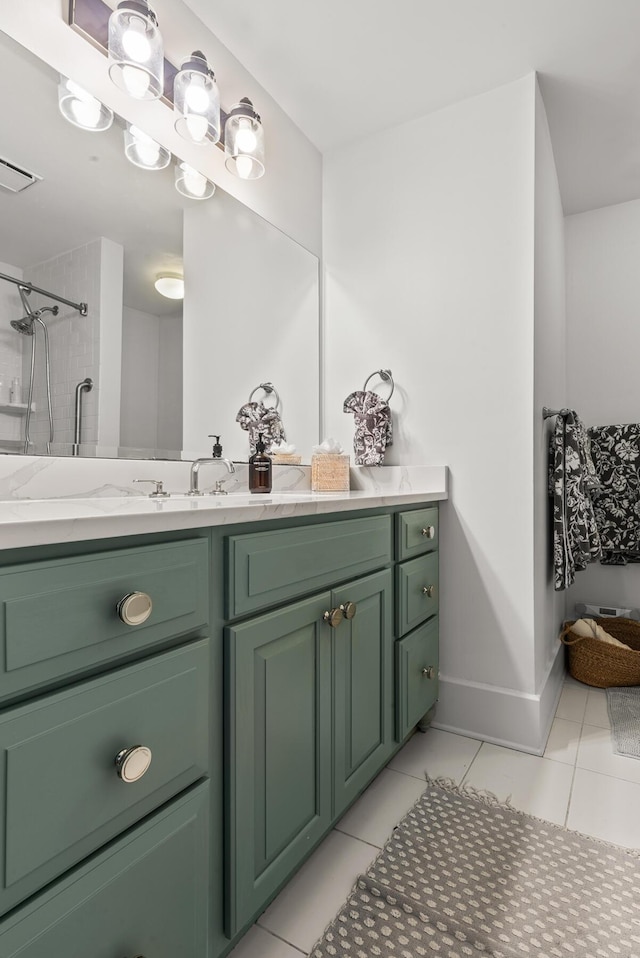4 Beaufain St Unit 207, Charleston, SC 29401 - full bath with vanity, tile patterned flooring, and a shower