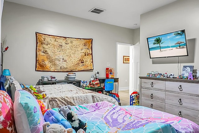 bedroom featuring hardwood / wood-style flooring