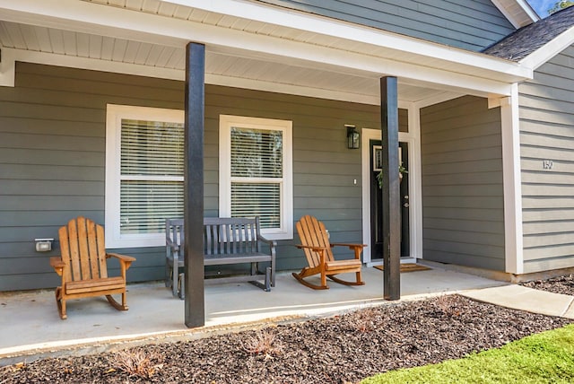 property entrance featuring a porch