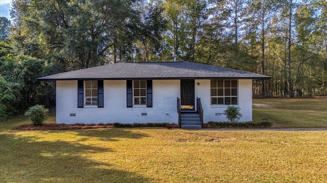 single story home with a front yard