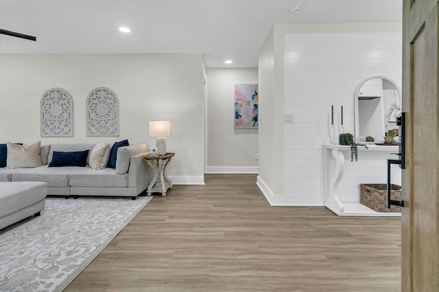 living room with light hardwood / wood-style floors