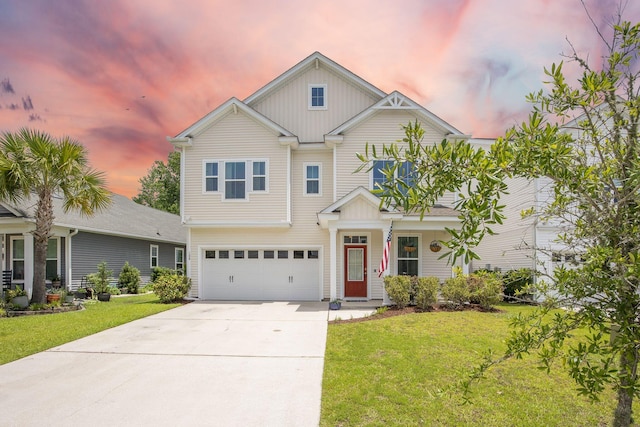 106 Sago Ct, Summerville, SC 29486 - view of front facade with board and batten siding, driveway, a garage, and a yard