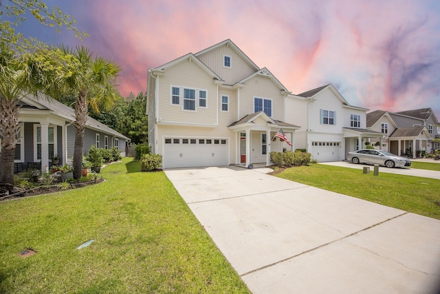 106 Sago Ct, Summerville, SC 29486 - view of front of home featuring a garage, driveway, a front lawn, and board and batten siding