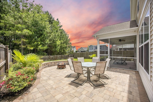 106 Sago Ct, Summerville, SC 29486 - fenced backyard with an outdoor fire pit, a patio, outdoor dining area, and a ceiling fan