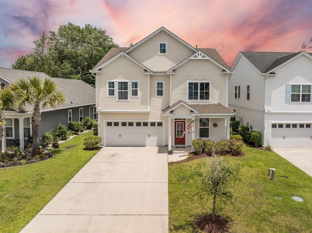 106 Sago Ct, Summerville, SC 29486 - view of front facade with concrete driveway, a garage, board and batten siding, a front yard, and roof with shingles
