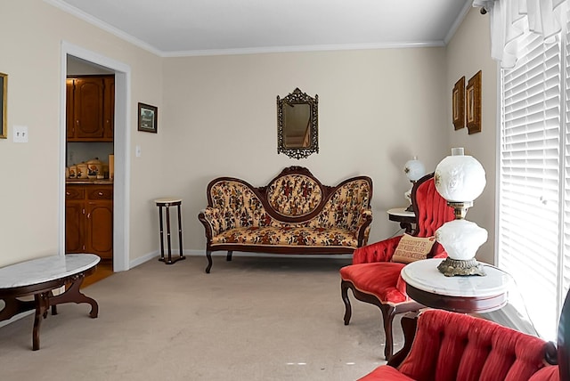 living area featuring ornamental molding and light carpet