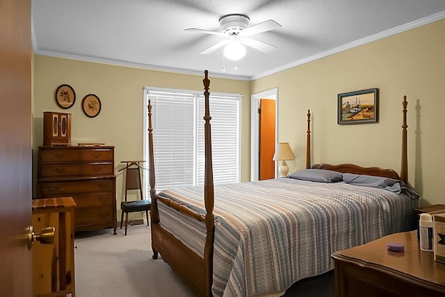 bedroom featuring ornamental molding, light carpet, and ceiling fan