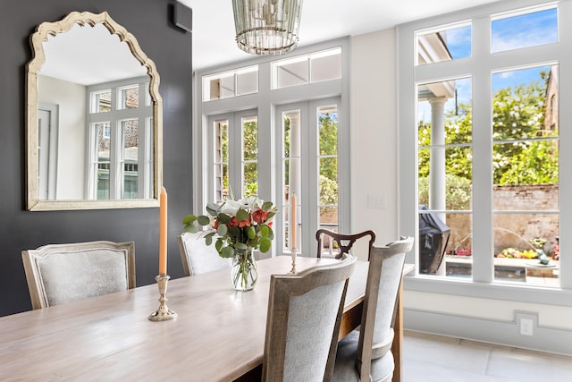 dining area with a notable chandelier