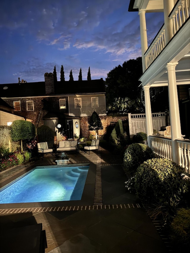 pool featuring a patio area