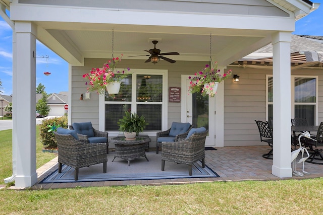 view of patio with an outdoor hangout area and ceiling fan