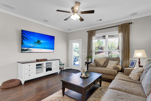 living room featuring crown molding, ceiling fan, and dark hardwood / wood-style flooring