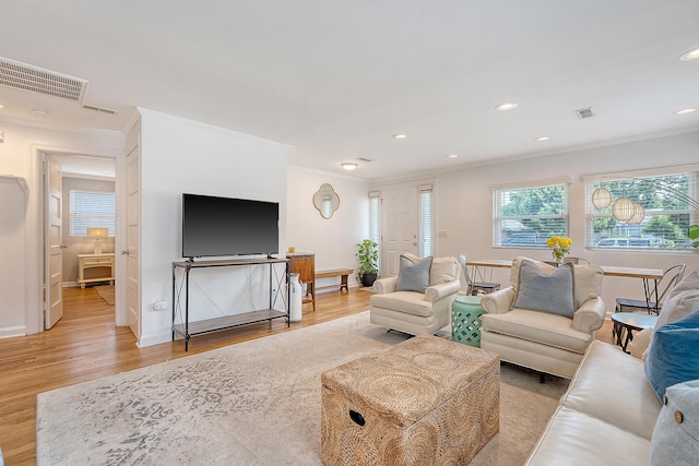 4587 Durant Ave, North Charleston, SC 29405 - living room with ornamental molding, light wood finished floors, recessed lighting, and baseboards