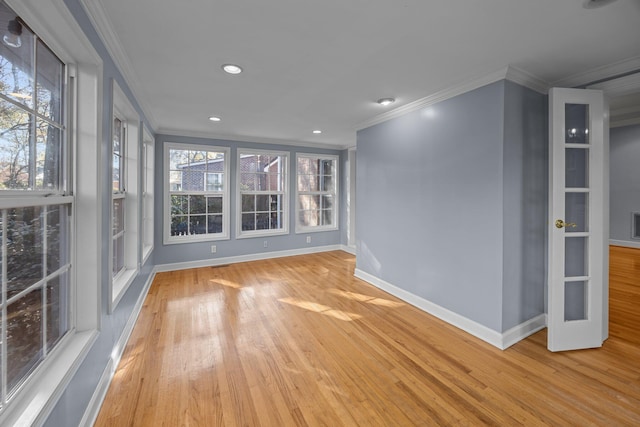 interior space featuring light hardwood / wood-style flooring and ornamental molding