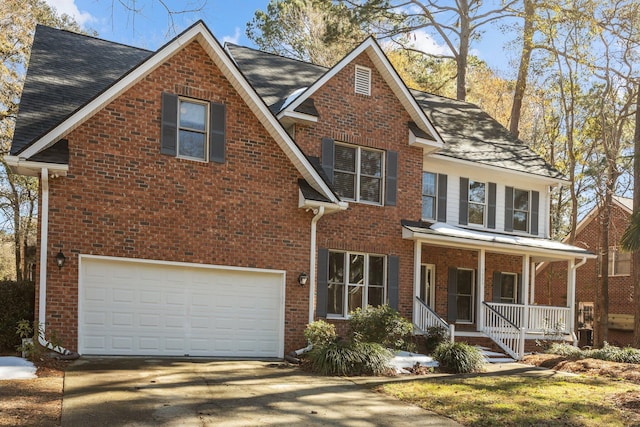 view of front of home featuring a garage and covered porch