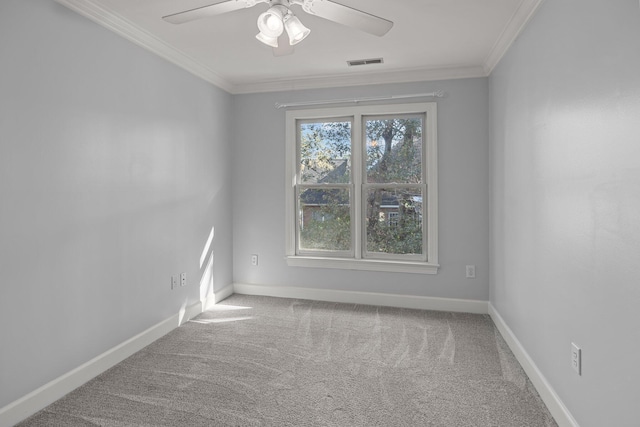 unfurnished room with crown molding, ceiling fan, and carpet flooring