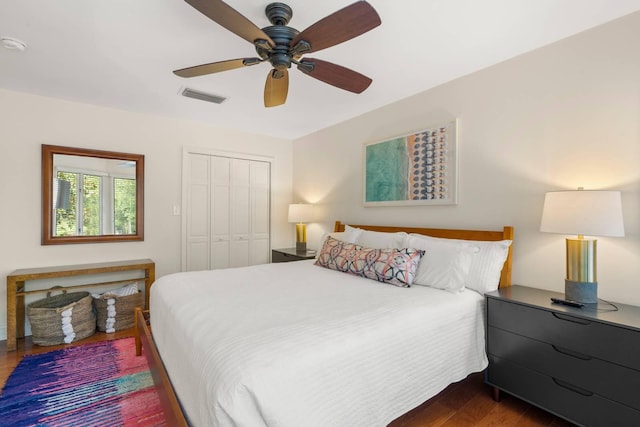 5558 Green Dolphin Way, Kiawah Island, SC 29455 - bedroom with dark wood-type flooring, a closet, and ceiling fan