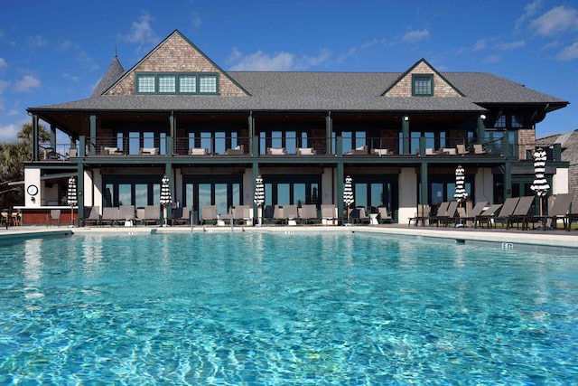 5558 Green Dolphin Way, Kiawah Island, SC 29455 - community pool featuring french doors and a patio area