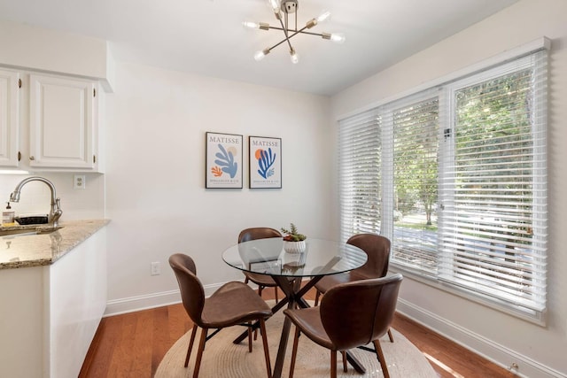 5558 Green Dolphin Way, Kiawah Island, SC 29455 - dining area with a chandelier and wood finished floors