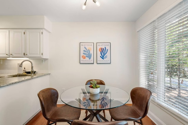 5558 Green Dolphin Way, Kiawah Island, SC 29455 - dining space featuring plenty of natural light and wood finished floors