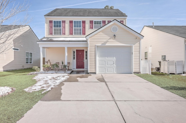 view of front facade with a garage, covered porch, and a front lawn