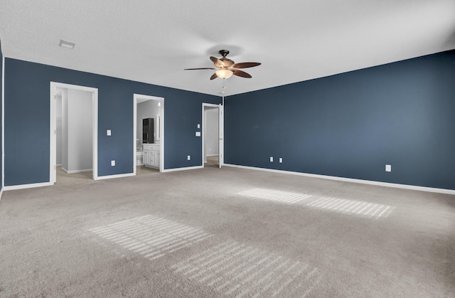 interior space with ceiling fan