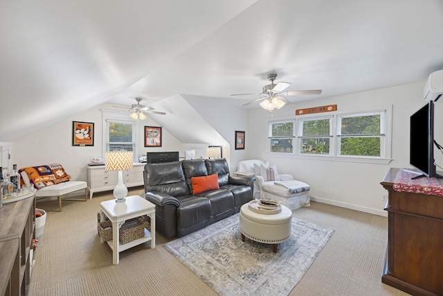 carpeted living room with ceiling fan, a wall mounted air conditioner, a healthy amount of sunlight, and lofted ceiling