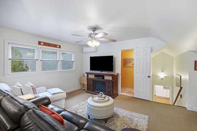 carpeted living room featuring a fireplace, a wall mounted AC, lofted ceiling, and ceiling fan