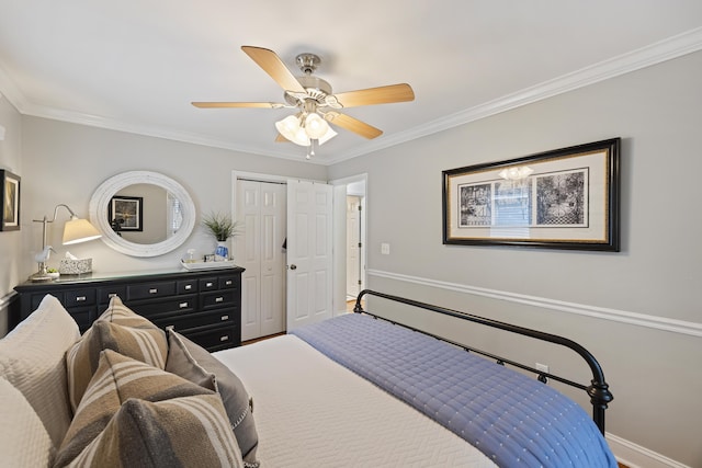 bedroom featuring ceiling fan and crown molding