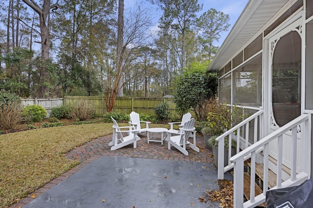 view of patio / terrace with a sunroom