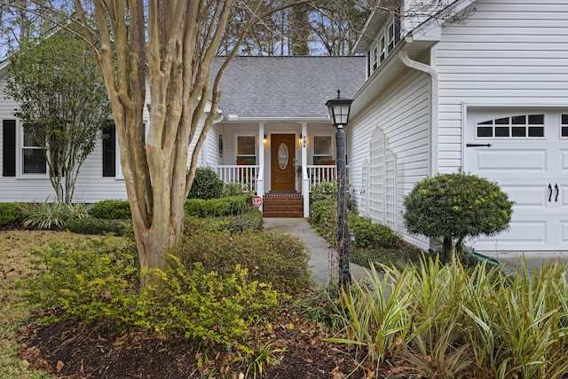 entrance to property featuring a porch